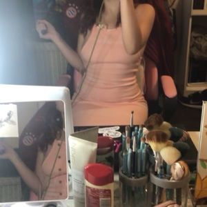 Pink skiny strap dress with a little bit of white